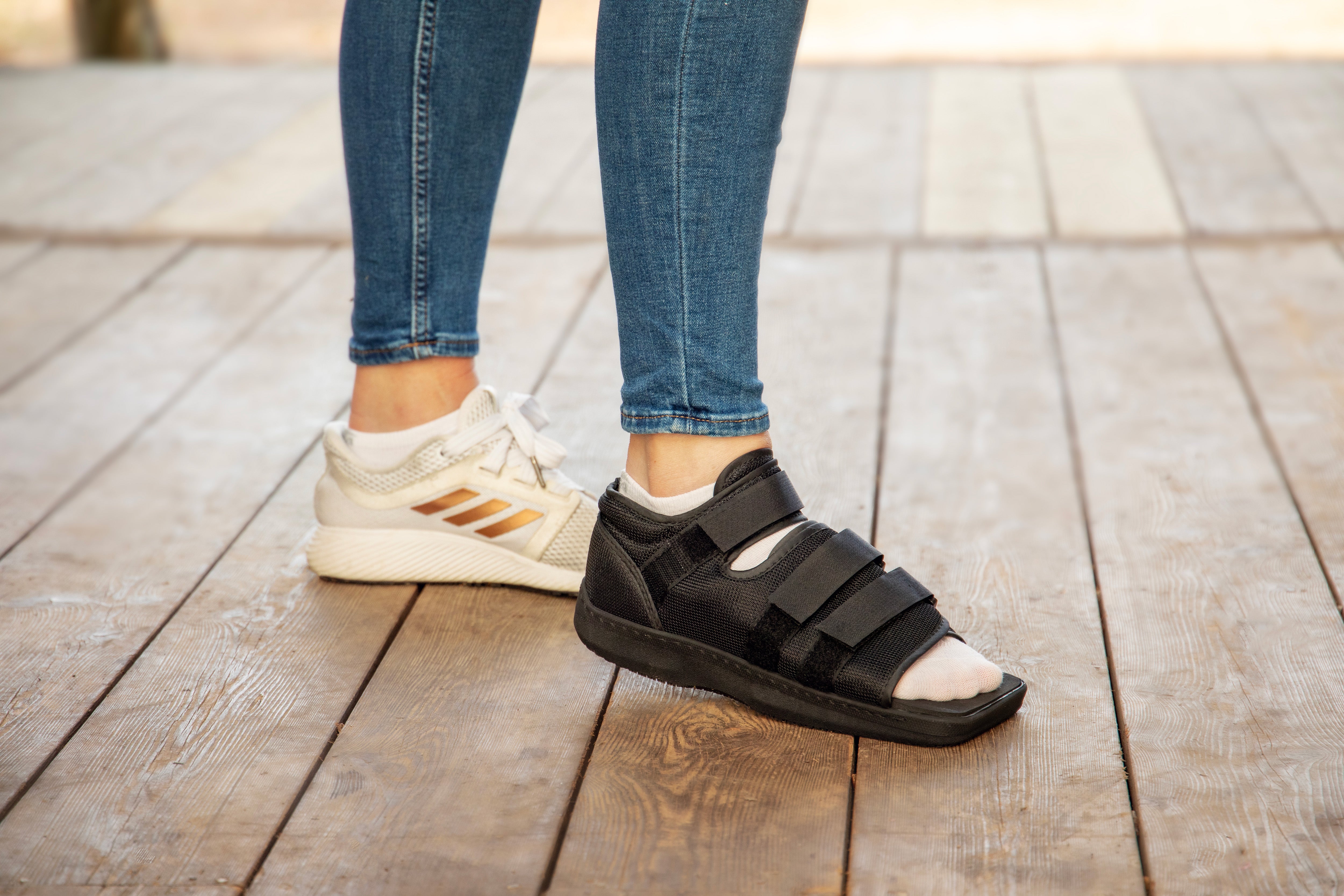 Brace Direct Post Op Shoe woman wearing the Brace Direct Post Op Shoe after foot surgery