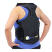  Rear view of the black Brace Align TLSO Thoracic Back Support Brace, worn by a model.
