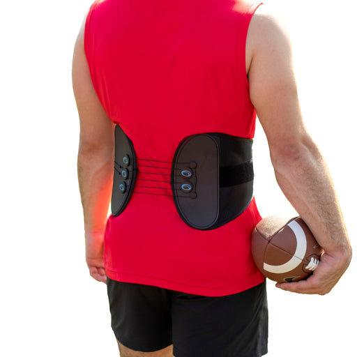 Rear view of a Brace Direct Low Profile Lumbar Back Support brace on an athlete.