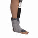 Close-up of woman using Brace Direct's medical-grade ergonomic therapy ankle pad.