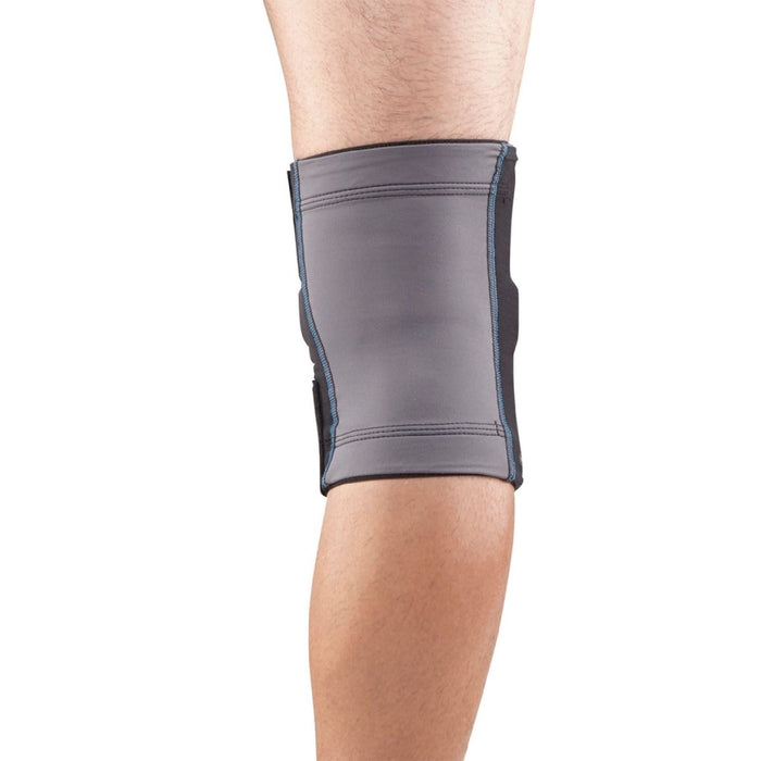 Rear view of the Breg FreeSport Athletic Knee Support Brace by Brace DIrect, worn by a model.