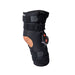 Side view of the Breg Recover Long Neoprene Knee Brace by Brace Direct, isolated on white.