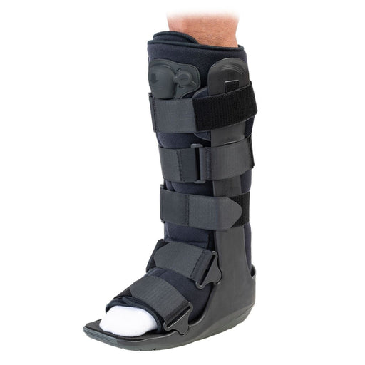 Side view of the Breg Tall Air-Cushioned SoftGait Walker Boot by Brace Direct, worn by a model.