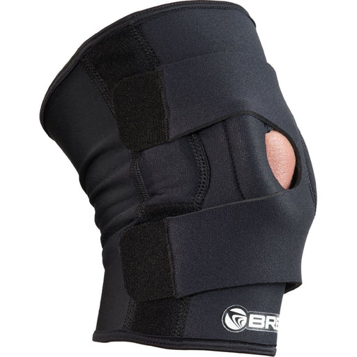 Side view of the Breg Universal Knee Brace with Hinged Lateral Stabilizer by Brace Direct, worn by a model.