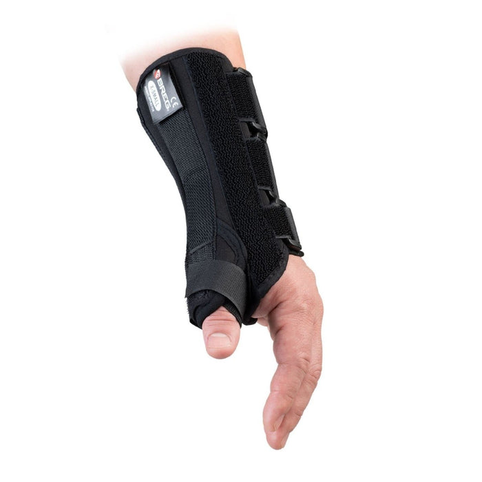 Side view of the Breg VersaFit Wrist Brace with Thumb Spica by Brace Direct, worn by a model.