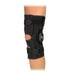 Side view of the Ossur Short Rebound Knee Brace - ROM Hinge Wrap by Brace Direct, worn by a model.