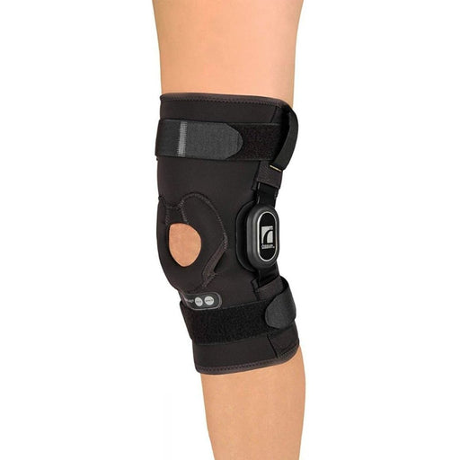 Side view of the Ossur Short Rebound Knee Brace - ROM Hinge Wrap by Brace Direct, worn by a model.