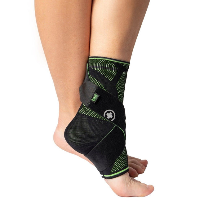 Side view of the Brace Direct TaloStabil Sport Ankle Compression Brace with Figure 8 Strap, worn by a model.